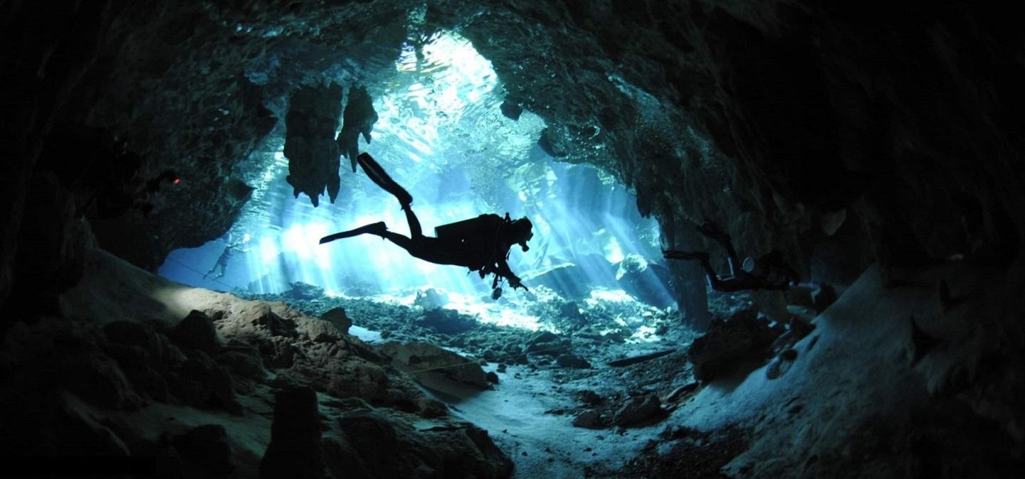 In cenotes, diving feels almost like flying